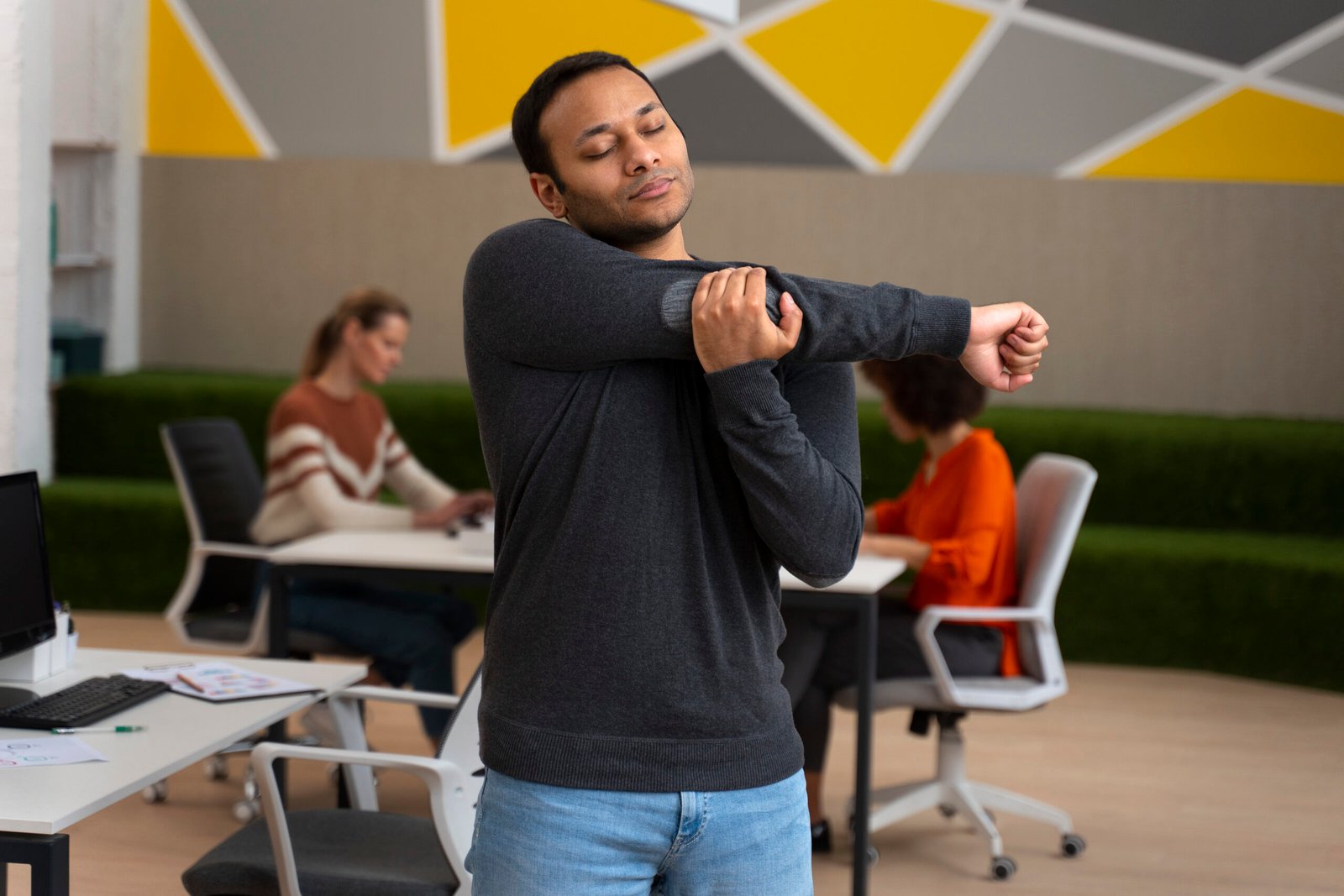 man-office-stretching-work-day (1)